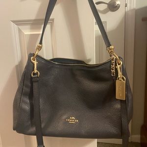 Coach purse - carried very minimally. Navy blue with gold accent. Great shape